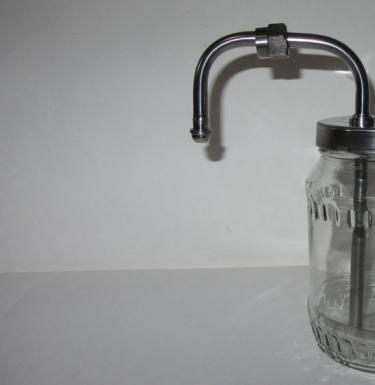 What is a bubbler in a moonshine still?
